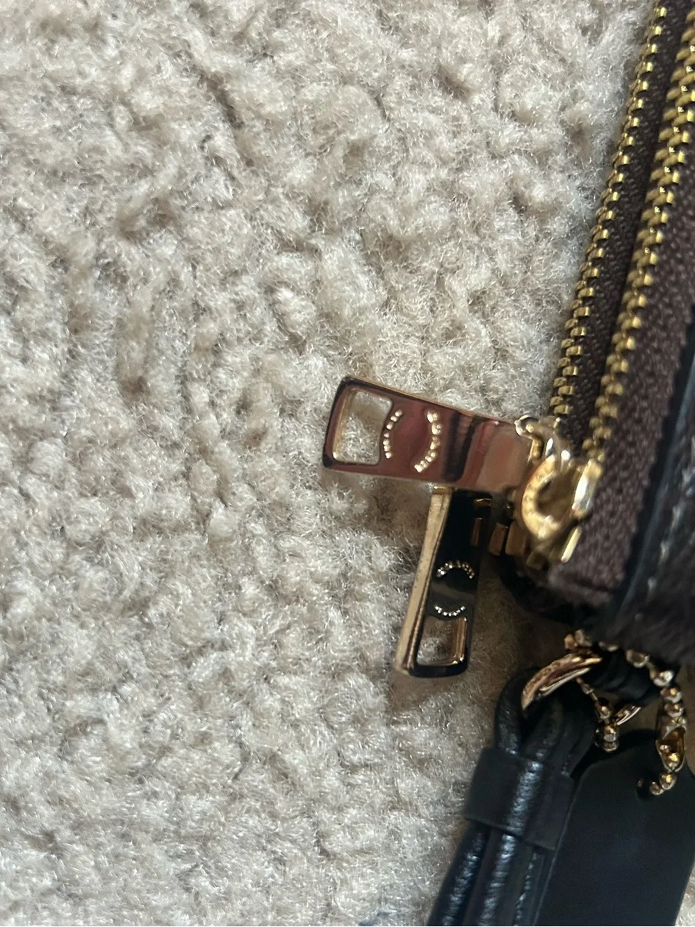 Coach Monogram Double Zip Wristlet in Brown and Black with Gold Hardware. F16109